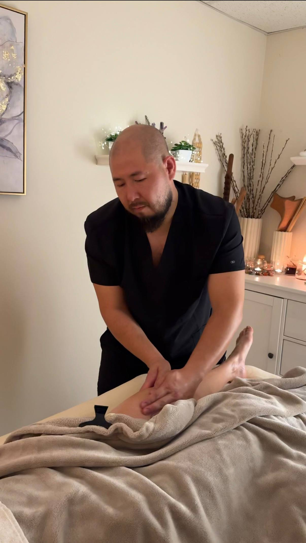 Tony delivering an in-home massage session